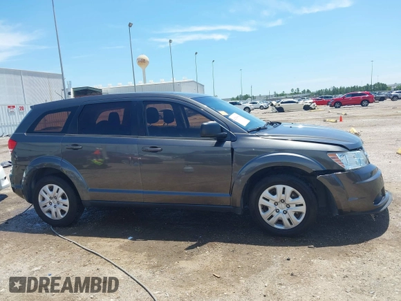 2015 Dodge Journey American Value z VIN 3C4PDCAB2FT637391, wystawiony jako IAAI lot #42354094 z przebiegiem 130 743 mil mil oraz . Historia ofert i sprzedaży dostępna na DreamBid. Obrazek 13.