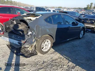 2025 Toyota Camry LE with VIN 4T1DAACK6SU013957, listed as a IAAI auction lot 41500800 with 31,414 mi miles and . Bid and sale history available at DreamBid. Image 4.