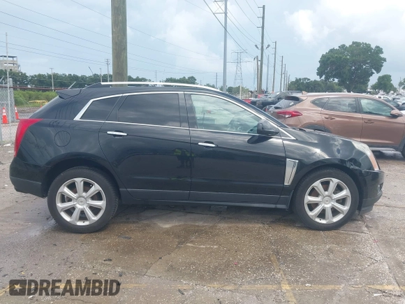 2015 Cadillac SRX Premium Collection with VIN 3GYFNGE30FS634363, listed as a IAAI auction lot 42672064 with 146,821 mi miles and . Bid and sale history available at DreamBid. Image 13.
