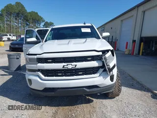 2016 Chevrolet Silverado 1500 LT with VIN 1GCVKREC4GZ106299, listed as a IAAI auction lot 41984118 with 181,626 mi miles and . Bid and sale history available at DreamBid. Image 12.