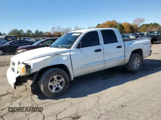 2006 Dodge Dakota SLT with VIN 1D7HE48N26S605314, listed as a Copart auction lot 84644704 with 153,265 mi miles and Salvage Title. Bid and sale history available at DreamBid. Image 1.