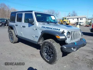 2023 Jeep Wrangler Rubicon with VIN 1C4JJXR66PW608856, listed as a IAAI auction lot 41757719 with 15,822 mi miles and . Bid and sale history available at DreamBid. Image 1.