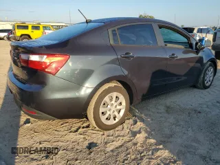 2014 Kia Rio EX with VIN KNADN4A39E6325590, listed as a Copart auction lot 71774344 with 90,785 mi miles and Salvage Title. Bid and sale history available at carsss.com. Image 3.