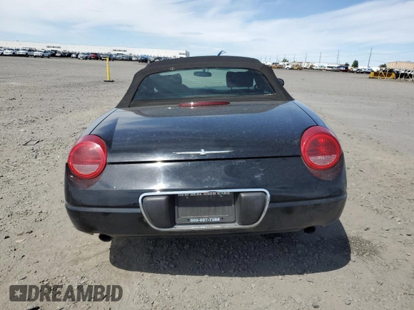 2002 Ford Thunderbird Hardtop Premium z VIN 1FAHP60A92Y117614, wystawiony jako Copart lot #59344735 z przebiegiem 83 723 mil mil oraz Szkoda całkowita • Salvage title. Historia ofert i sprzedaży dostępna na DreamBid. Obrazek 6.