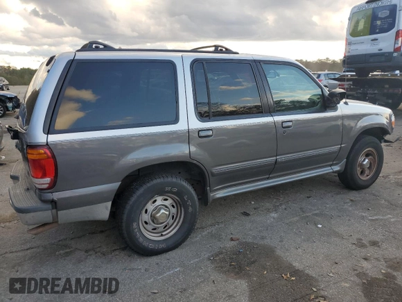 1999 Ford Explorer XLT z VIN 1FMZU32E4XUA16402, wystawiony jako Copart lot #85243074 z przebiegiem 148 110 mil mil oraz Szkoda całkowita • Salvage title. Historia ofert i sprzedaży dostępna na DreamBid. Obrazek 3.