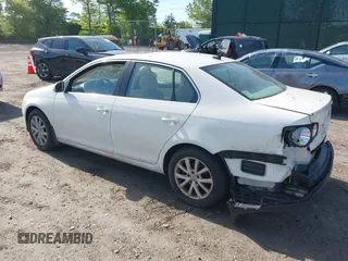 2010 Volkswagen Jetta Limited Edition with VIN 3VWRZ7AJ7AM058938, listed as a IAAI auction lot 42348838 with 102,482 mi miles and . Bid and sale history available at DreamBid. Image 3.