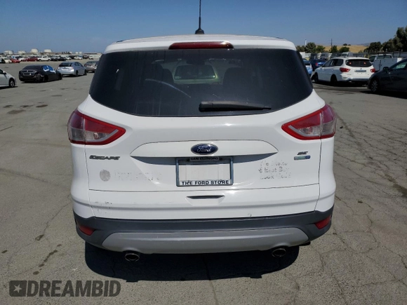 2014 Ford Escape SE z VIN 1FMCU9GX2EUE42010, wystawiony jako Copart lot #59228265 z przebiegiem 107 863 mil mil oraz Czysty tytuł • Clean title. Historia ofert i sprzedaży dostępna na DreamBid. Obrazek 6.
