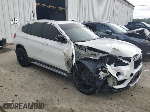 2019 BMW X1 xDrive28i with VIN WBXHT3C52K3H34021, listed as a Copart auction lot 64032535 with 30,752 mi miles and Salvage title. Bid and sale history available at DreamBid. Image 4.