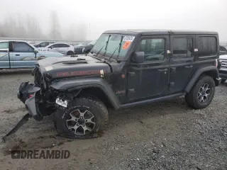 2021 Jeep Wrangler Unlimited Rubicon with VIN 1C4JJXFM7MW818199, listed as a Copart auction lot 87428474 with 18,696 mi miles and Salvage Title. Bid and sale history available at carsss.com. Image 1.
