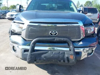 2010 Toyota Tundra with VIN 5TFEY5F11AX097360, listed as a IAAI auction lot 41990256 with 350,830 mi miles and . Bid and sale history available at DreamBid. Image 6.