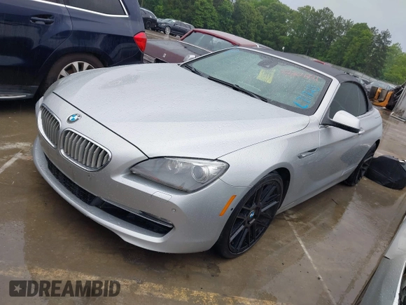2012 BMW 6 Series 650i with VIN WBALZ3C5XCDL71723, listed as a IAAI auction lot 42204721 with 132,912 mi miles and . Bid and sale history available at carsss.com. Image 17.