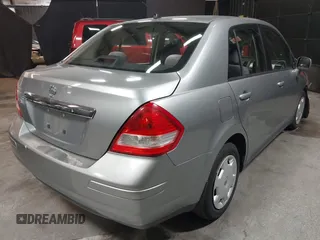 2009 Nissan Versa 1.8 S with VIN 3N1BC11EX9L396439, listed as a IAAI auction lot 42049665 with 49,617 mi miles. Bid and sale history available at carsss.com. Image 4.