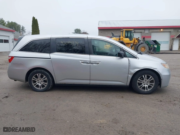 2011 Honda Odyssey EX-L with VIN 5FNRL5H65BB047291, listed as a IAAI auction lot 42094374 with 200,372 mi miles. Bid and sale history available at carsss.com. Image 13.
