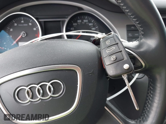 2015 Audi Q7 Premium Plus with VIN WA1LGAFE6FD015762, listed as a IAAI auction lot 42260301 with 125,748 mi miles and . Bid and sale history available at DreamBid. Image 11.