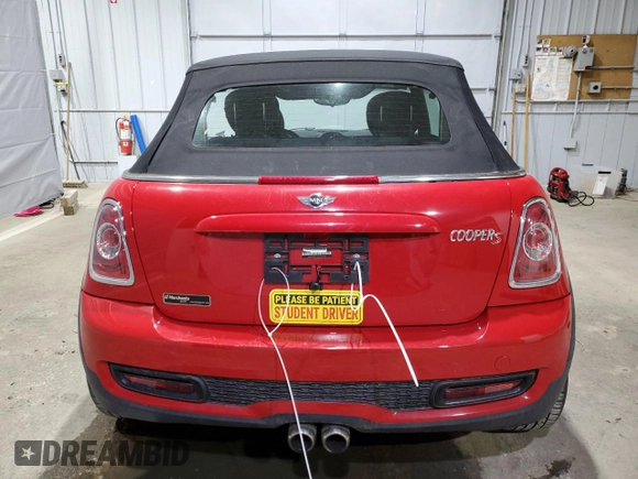 2014 MINI Convertible S z VIN WMWZP3C5XET706388, wystawiony jako Copart lot #51065435 z przebiegiem 122 379 mil mil oraz Szkoda całkowita • Salvage title. Historia ofert i sprzedaży dostępna na DreamBid. Obrazek 6.
