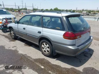 1999 Subaru Legacy Outback z VIN 4S3BG685XX7600386, wystawiony jako IAAI lot #42495176 z przebiegiem 255 310 mil mil oraz . Historia ofert i sprzedaży dostępna na DreamBid. Obrazek 3.