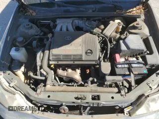 2001 Toyota Avalon XL z VIN 4T1BF28B11U154490, wystawiony jako Copart lot #49821065 z przebiegiem 197 805 mil mil oraz Szkoda całkowita • Salvage title. Historia ofert i sprzedaży dostępna na DreamBid. Obrazek 11.