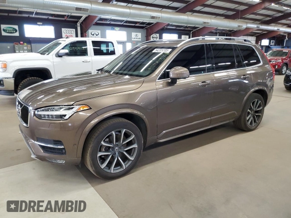 2017 Volvo XC90 Momentum z VIN YV4A22PK9H1115068, wystawiony jako Copart lot #54205205 z przebiegiem 130 082 mil mil oraz Czysty tytuł • Clean title. Historia ofert i sprzedaży dostępna na DreamBid. Obrazek 1.