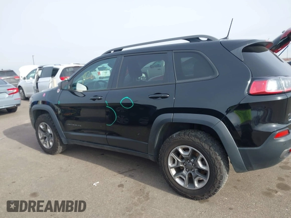 2019 Jeep Cherokee Trailhawk Elite with VIN 1C4PJMBX0KD395421, listed as a IAAI auction lot 41265048 with 70,070 mi miles. Bid and sale history available at carsss.com. Image 14.