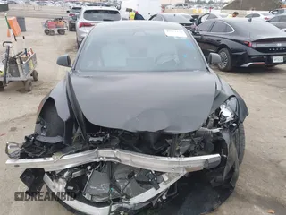 2019 Tesla Model 3 Mid Range with VIN 5YJ3E1EA8KF538083, listed as a IAAI auction lot 41891458 with 46,958 mi miles and . Bid and sale history available at carsss.com. Image 12.