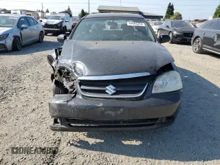 2008 Suzuki Forenza z VIN KL5JD56ZX8K974392, wystawiony jako Copart lot #64694854 z przebiegiem 145 180 mil mil oraz Szkoda całkowita • Salvage title. Historia ofert i sprzedaży dostępna na DreamBid. Obrazek 5.