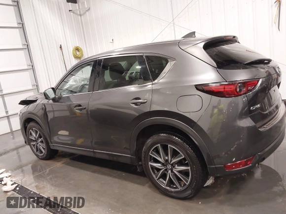 2017 Mazda CX-5 Grand Touring with VIN JM3KFADLXH0151593, listed as a IAAI auction lot 41823378 with 149,299 mi miles. Bid and sale history available at carsss.com. Image 14.