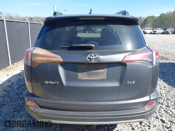2018 Toyota RAV4 XLE with VIN 2T3WFREV2JW450019, listed as a IAAI auction lot 41704084 with 257,737 mi miles. Bid and sale history available at carsss.com. Image 16.