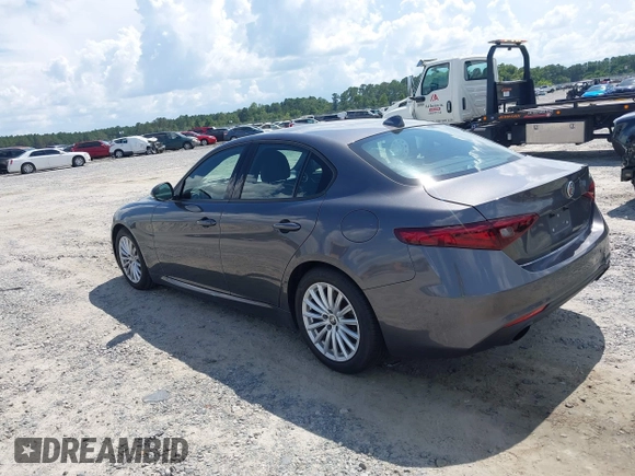 2023 Alfa Romeo Giulia with VIN ZARFAMAN0P7670423, listed as a IAAI auction lot 42842712 with 54,512 mi miles and . Bid and sale history available at DreamBid. Image 3.