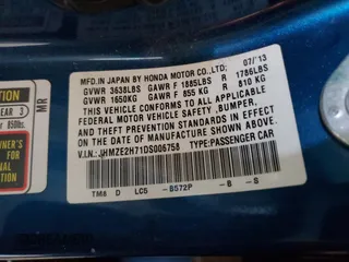 2013 Honda Insight EX with VIN JHMZE2H71DS006758, listed as a Copart auction lot 55296825 with 174,046 mi miles and Salvage title. Bid and sale history available at DreamBid. Image 13.
