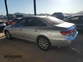 2009 Hyundai Azera Limited with VIN KMHFC46F69A369968, listed as a Copart auction lot 64187465 with 138,889 mi miles and Salvage title. Bid and sale history available at DreamBid. Image 2.