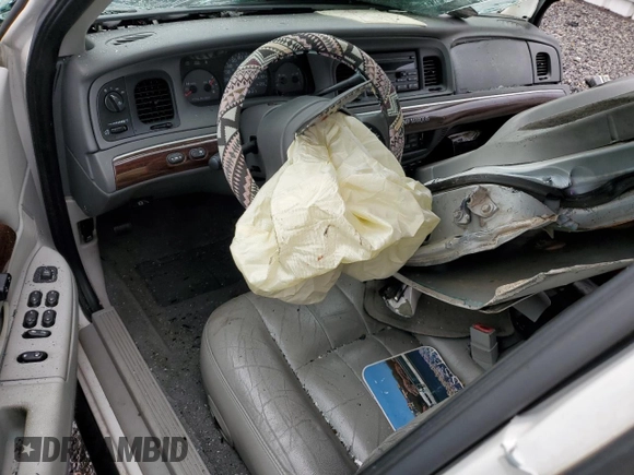 2003 Mercury Grand Marquis LS Premium with VIN 2MEFM75W13X667779, listed as a Copart auction lot 52869985 with 127,506 mi miles and Salvage Title. Bid and sale history available at DreamBid. Image 8.