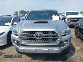 2017 Toyota Tacoma SR5 with VIN 5TFAZ5CN3HX042874, listed as a IAAI auction lot 42022752 with 104,013 mi miles and . Bid and sale history available at carsss.com. Image 12.