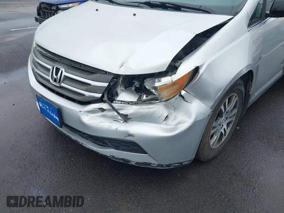 2012 Honda Odyssey EX with VIN 5FNRL5H46CB016065, listed as a IAAI auction lot 41849195 with 125,400 mi miles and . Bid and sale history available at DreamBid. Image 6.