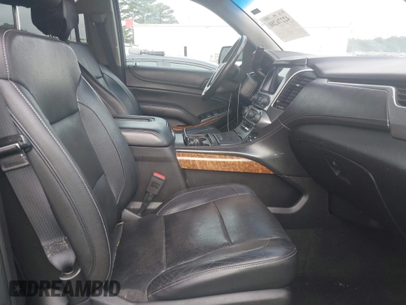 2018 Chevrolet Suburban Premier with VIN 1GNSCJKC9JR100504, listed as a IAAI auction lot 42276280 with 153,916 mi miles and . Bid and sale history available at DreamBid. Image 5.