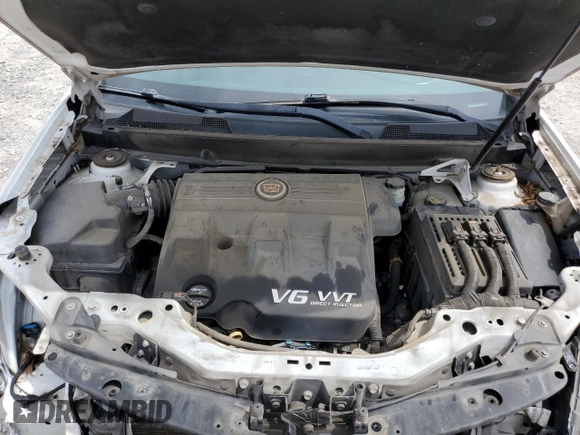 2014 Cadillac SRX Premium Collection z VIN 3GYFNDE37ES652548, wystawiony jako Copart lot #65895833 z przebiegiem 151 653 mil mil oraz Szkoda całkowita • Salvage title. Historia ofert i sprzedaży dostępna na DreamBid. Obrazek 11.