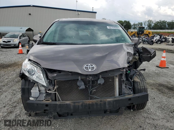 2012 Toyota Sienna XLE AAS with VIN 5TDYK3DC0CS251735, listed as a Copart auction lot 62208805 with 217,504 mi miles and Clean title. Bid and sale history available at DreamBid. Image 5.