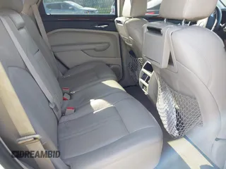 2011 Cadillac SRX Performance Collection z VIN 3GYFNBEYXBS543819, wystawiony jako IAAI lot #42159051 z przebiegiem Nie podano mil oraz . Historia ofert i sprzedaży dostępna na DreamBid. Obrazek 8.
