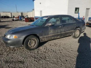 2000 Mazda 626 LX with VIN 1YVGF22D5Y5120152, listed as a Copart auction lot 44571595 with 177,624 mi miles and Salvage Title. Bid and sale history available at carsss.com. Image 1.