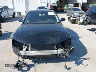 2014 Audi A4 Premium Plus with VIN WAUFFAFL2EN021987, listed as a IAAI auction lot 41888383 with 137,170 mi miles. Bid and sale history available at carsss.com. Image 13.