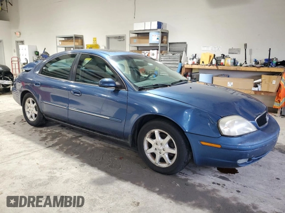 2002 Mercury Sable LS with VIN 1MEHM55S12A654810, listed as a Copart auction lot 83073514 with 185,246 mi miles and Salvage Title. Bid and sale history available at DreamBid. Image 4.