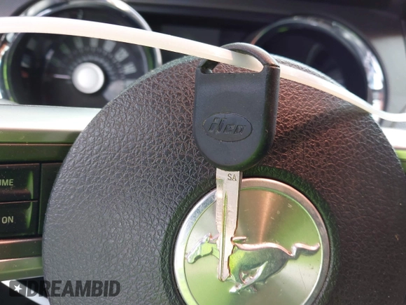 2012 Ford Mustang V6 with VIN 1ZVBP8EM1C5201733, listed as a IAAI auction lot 42162220 with 311,404 mi miles and . Bid and sale history available at DreamBid. Image 11.