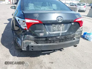 2016 Toyota Corolla L with VIN 5YFBURHEXGP406823, listed as a IAAI auction lot 41798717 with 156,423 mi miles and . Bid and sale history available at DreamBid. Image 6.