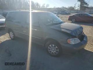 2005 Kia Sedona LX with VIN KNDUP132656738101, listed as a Copart auction lot 87332664 with 152,315 mi miles and Salvage Title. Bid and sale history available at carsss.com. Image 4.
