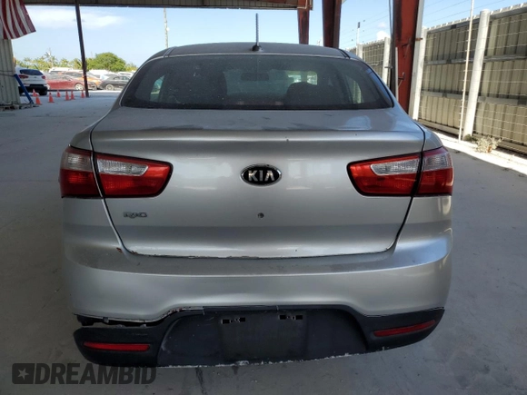 2013 Kia Rio LX z VIN KNADM4A30D6190131, wystawiony jako Copart lot #54657615 z przebiegiem 165 395 mil mil oraz Szkoda całkowita • Salvage title. Historia ofert i sprzedaży dostępna na DreamBid. Obrazek 6.