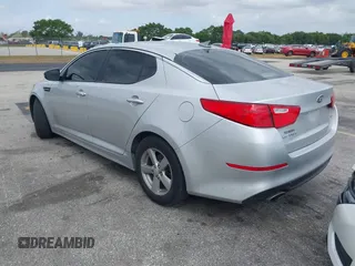2015 Kia Optima LX with VIN 5XXGM4A7XFG452440, listed as a IAAI auction lot 41917552 with 68,470 mi miles and . Bid and sale history available at DreamBid. Image 3.