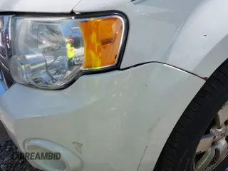 2012 Ford Escape Limited with VIN 1FMCU0E7XCKB71186, listed as a IAAI auction lot 41660455 with 160,863 mi miles. Bid and sale history available at carsss.com. Image 13.