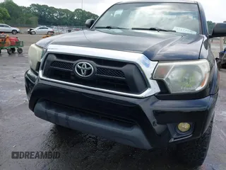 2014 Toyota Tacoma with VIN 5TFLU4EN5EX101434, listed as a IAAI auction lot 42273927 with 216,394 mi miles and . Bid and sale history available at DreamBid. Image 6.