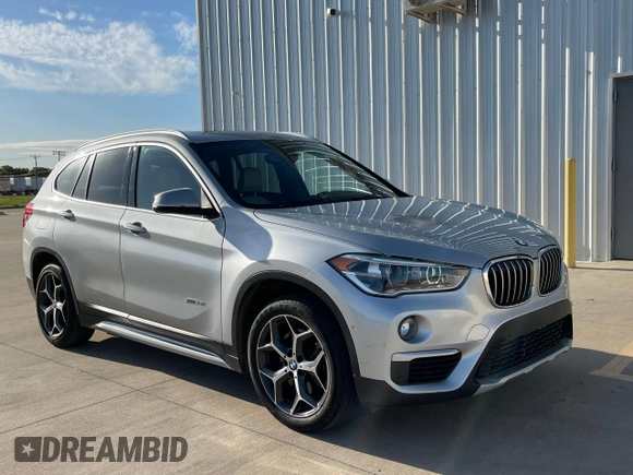 2017 BMW X1 sDrive28i with VIN WBXHU7C39H5H34971, listed as a Copart auction lot 51869265 with 108,051 mi miles and Clean Title. Bid and sale history available at carsss.com. Image 1.