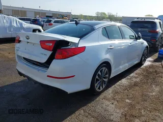 2015 Kia Optima SX Turbo with VIN 5XXGR4A65FG488237, listed as a IAAI auction lot 41978359 with 157,216 mi miles and . Bid and sale history available at DreamBid. Image 4.