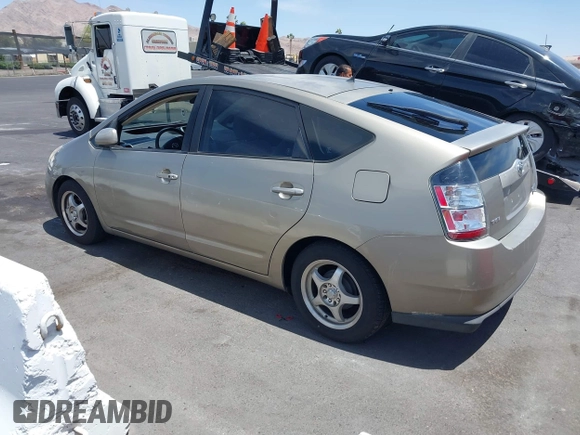 2005 Toyota Prius with VIN JTDKB20U950123255, listed as a IAAI auction lot 42256870 with 226,904 mi miles and . Bid and sale history available at DreamBid. Image 3.